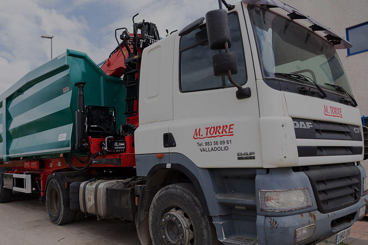 M. Torre truck focused on drivers cabin.