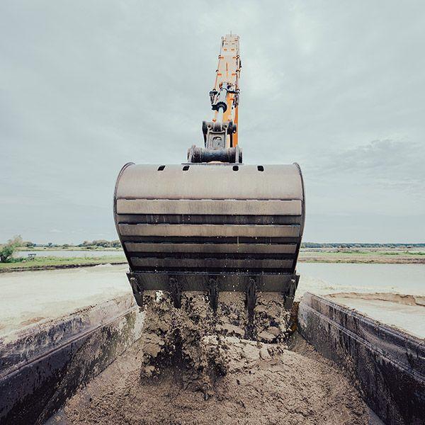 Front view of an excavator bucket.